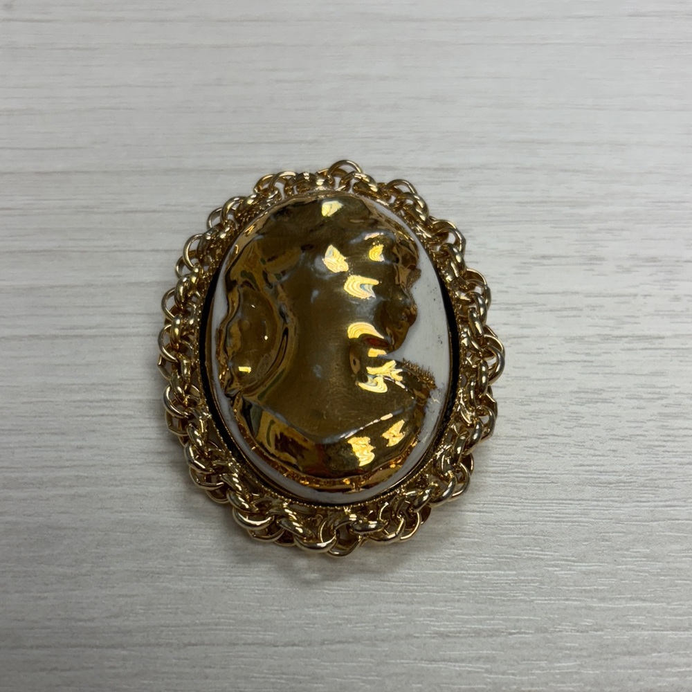 Elegant Gold Cameo Brooch